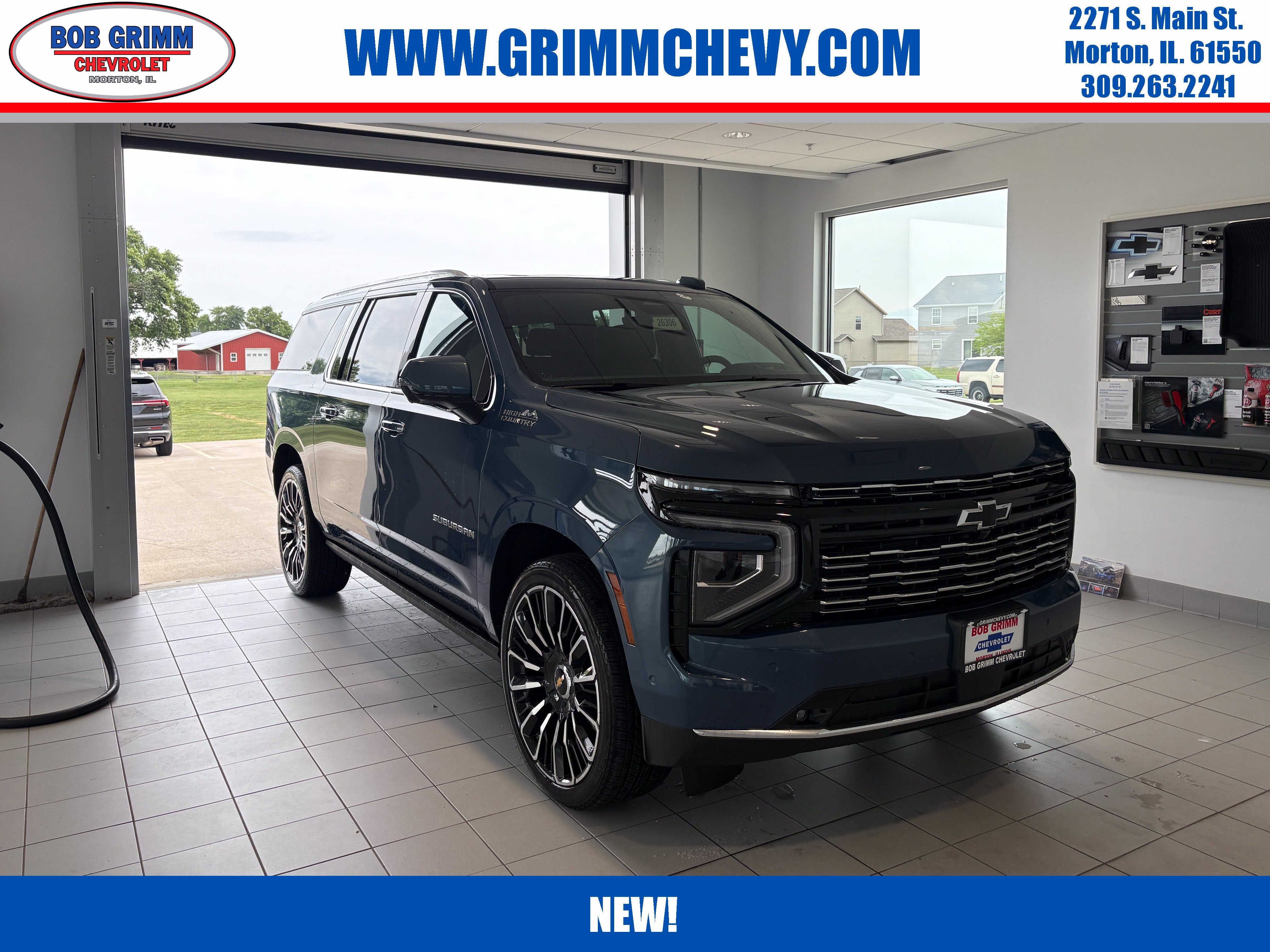 2026 Chevrolet Suburban High Country in Lakeshore Blue Metallic — front three-quarter view