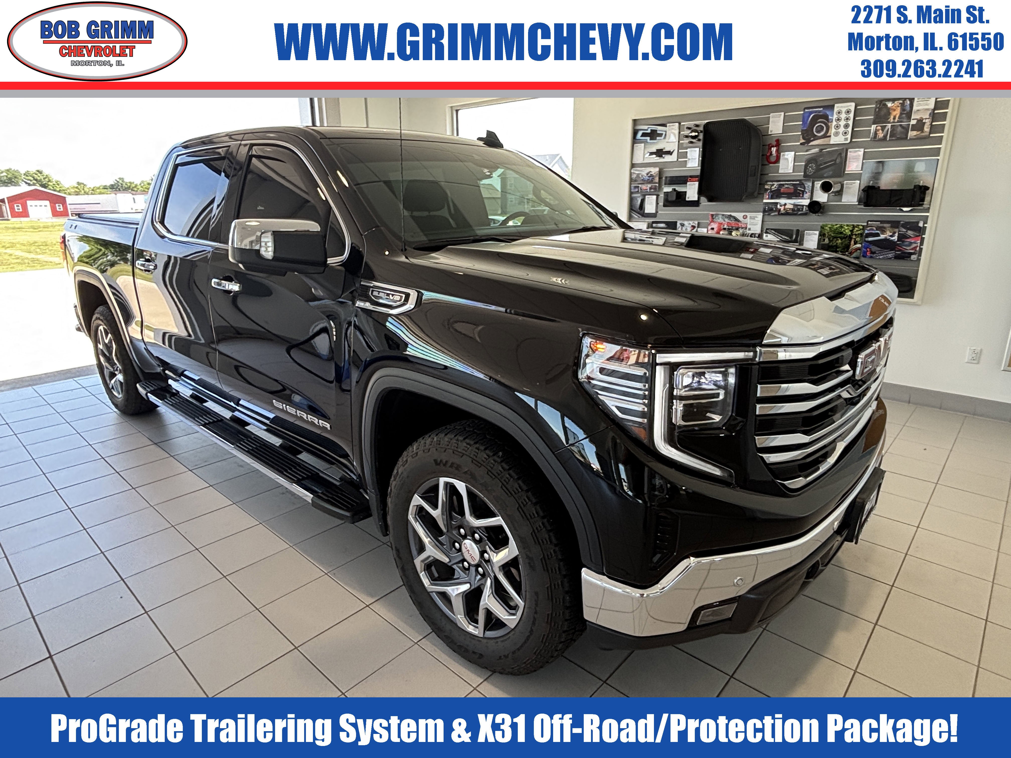 2025 GMC Sierra 1500 SLT in Onyx Black — front three-quarter view