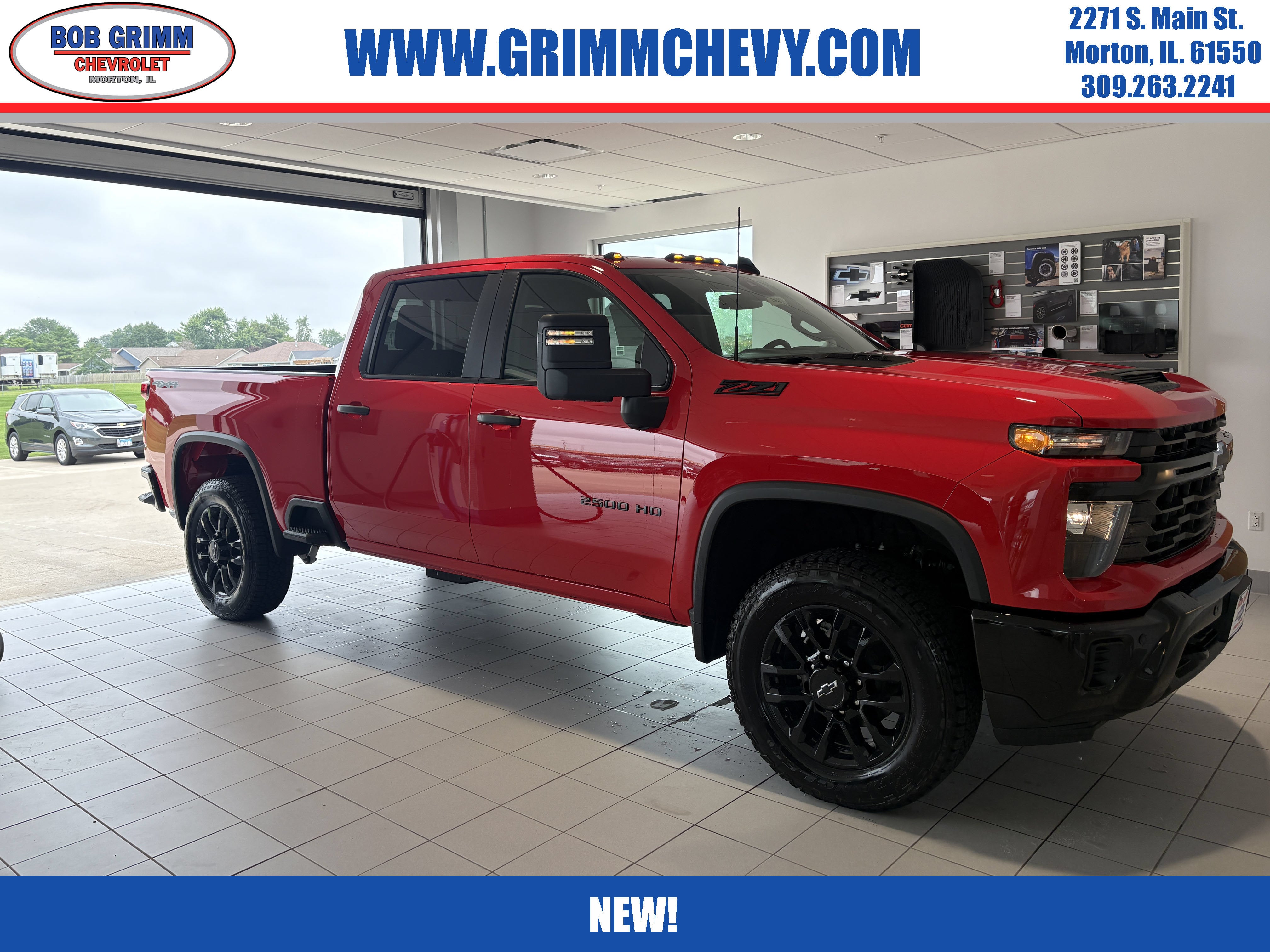 2026 Chevrolet Silverado 2500 HD Custom in Red Hot — front three-quarter view