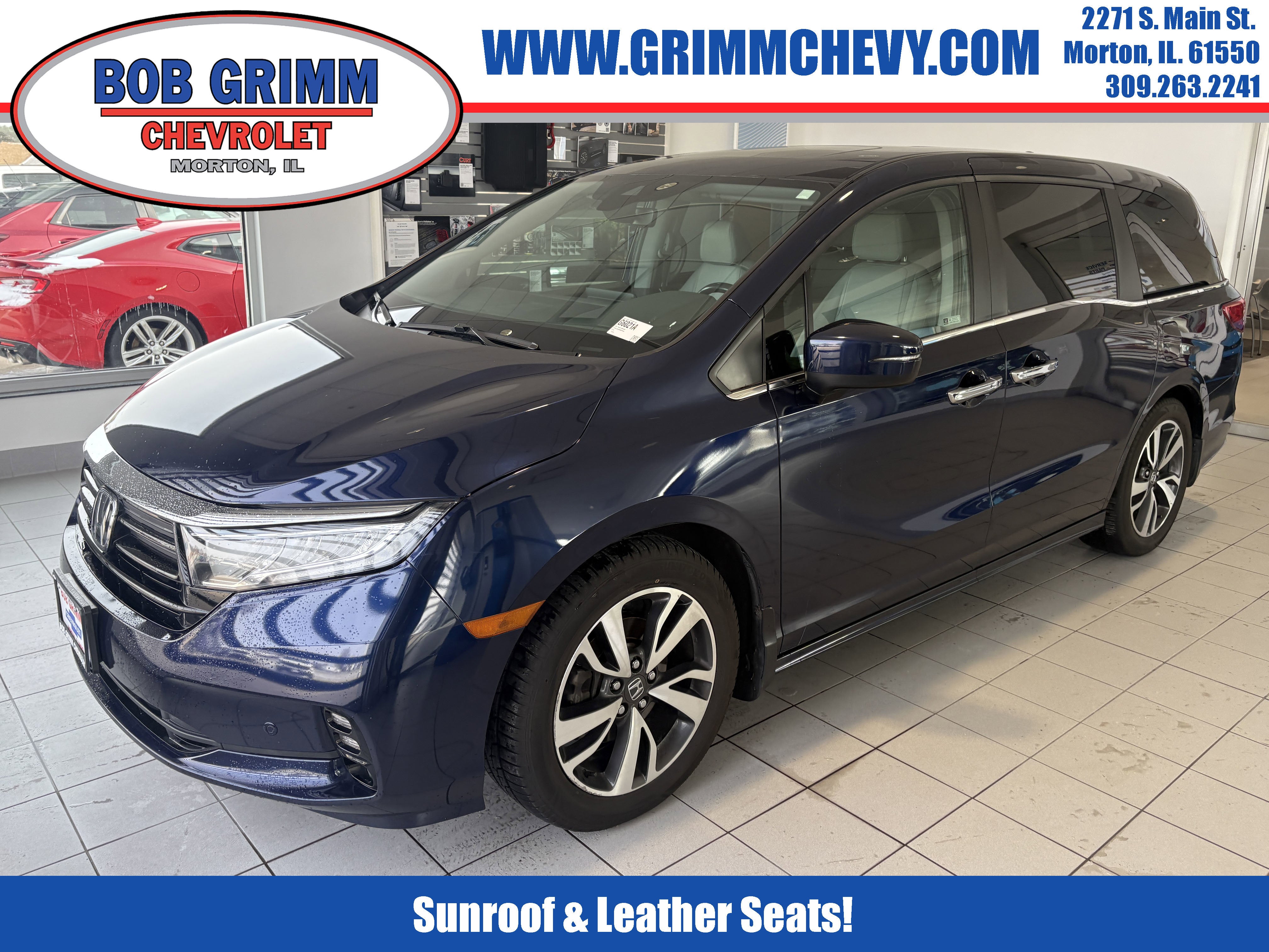 2021 Honda Odyssey Touring in Blue — front three-quarter view